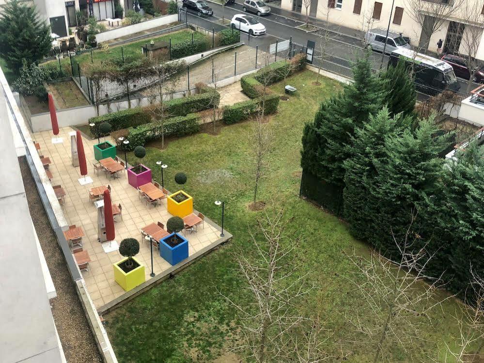 Hotel Courtyard By Marriott Paris Saint Denis Esterno foto